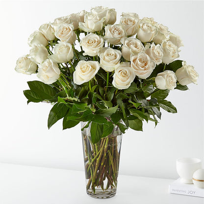 12 WHITE ROSES ARRANGED