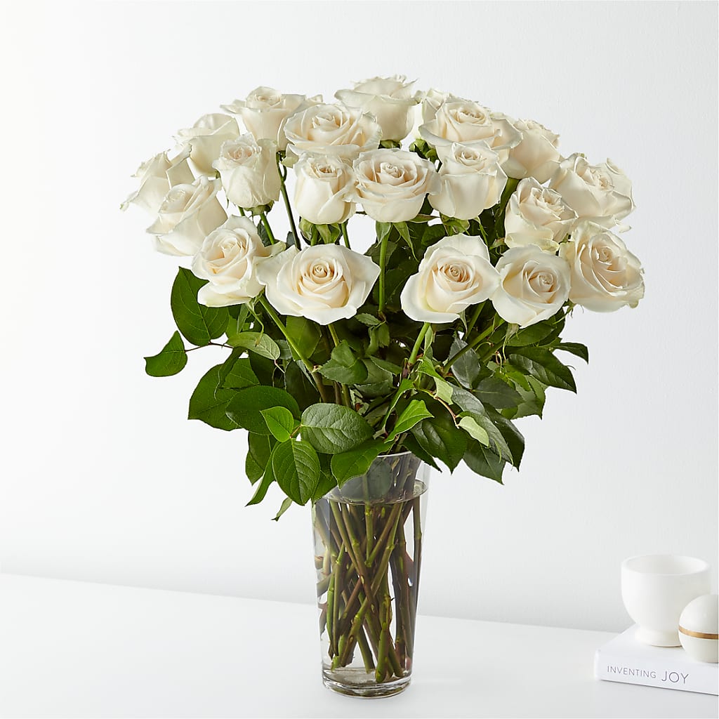 12 WHITE ROSES ARRANGED